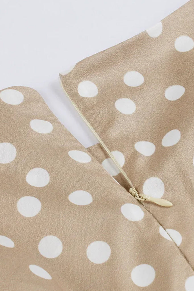 Osprey beige polka dot jurk