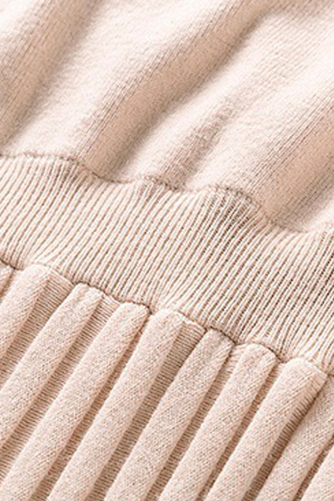 Ursa ivoorkleurige gebreide jurk met plooien