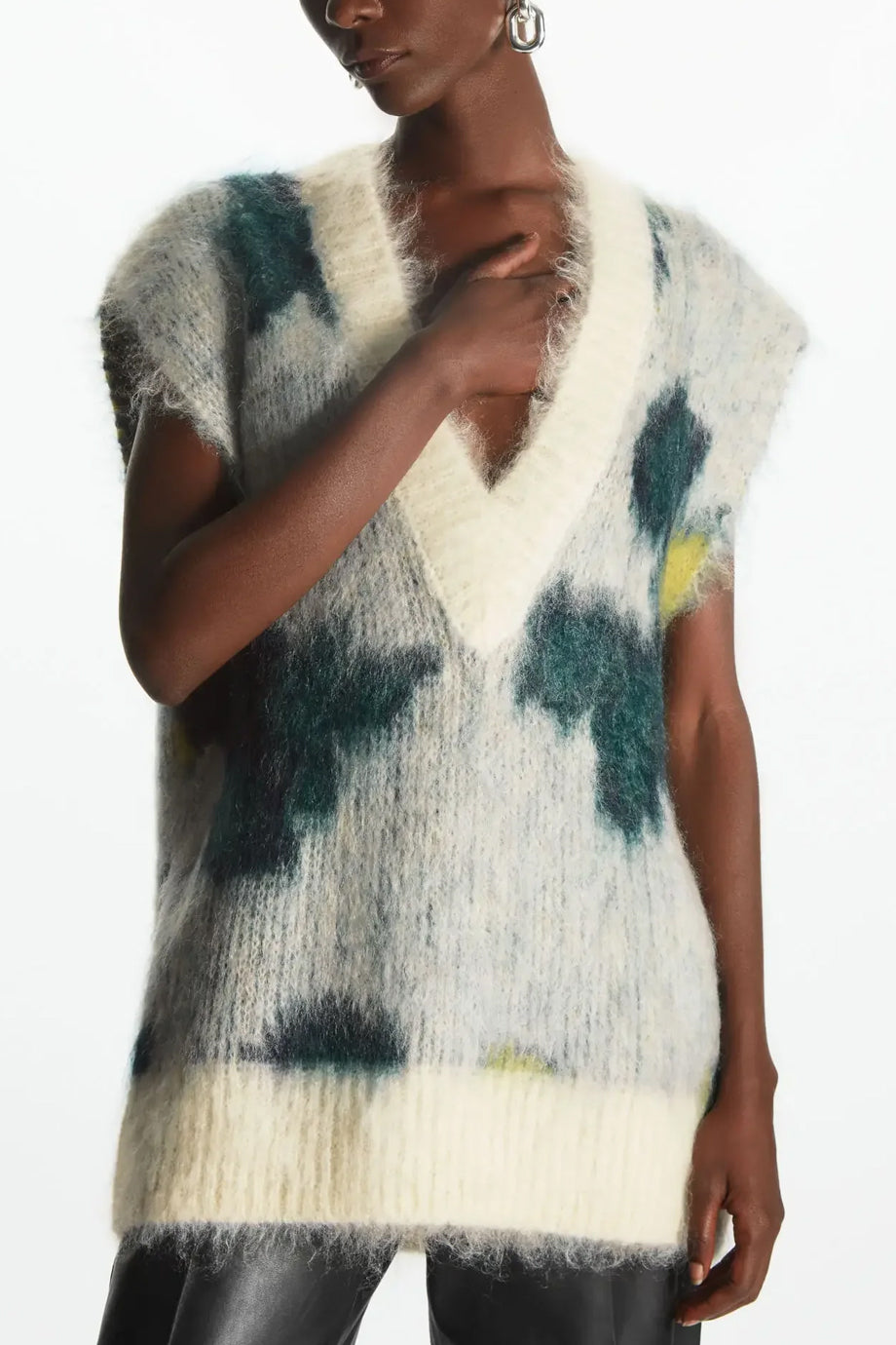 Theane Mouwloze V-halstrui