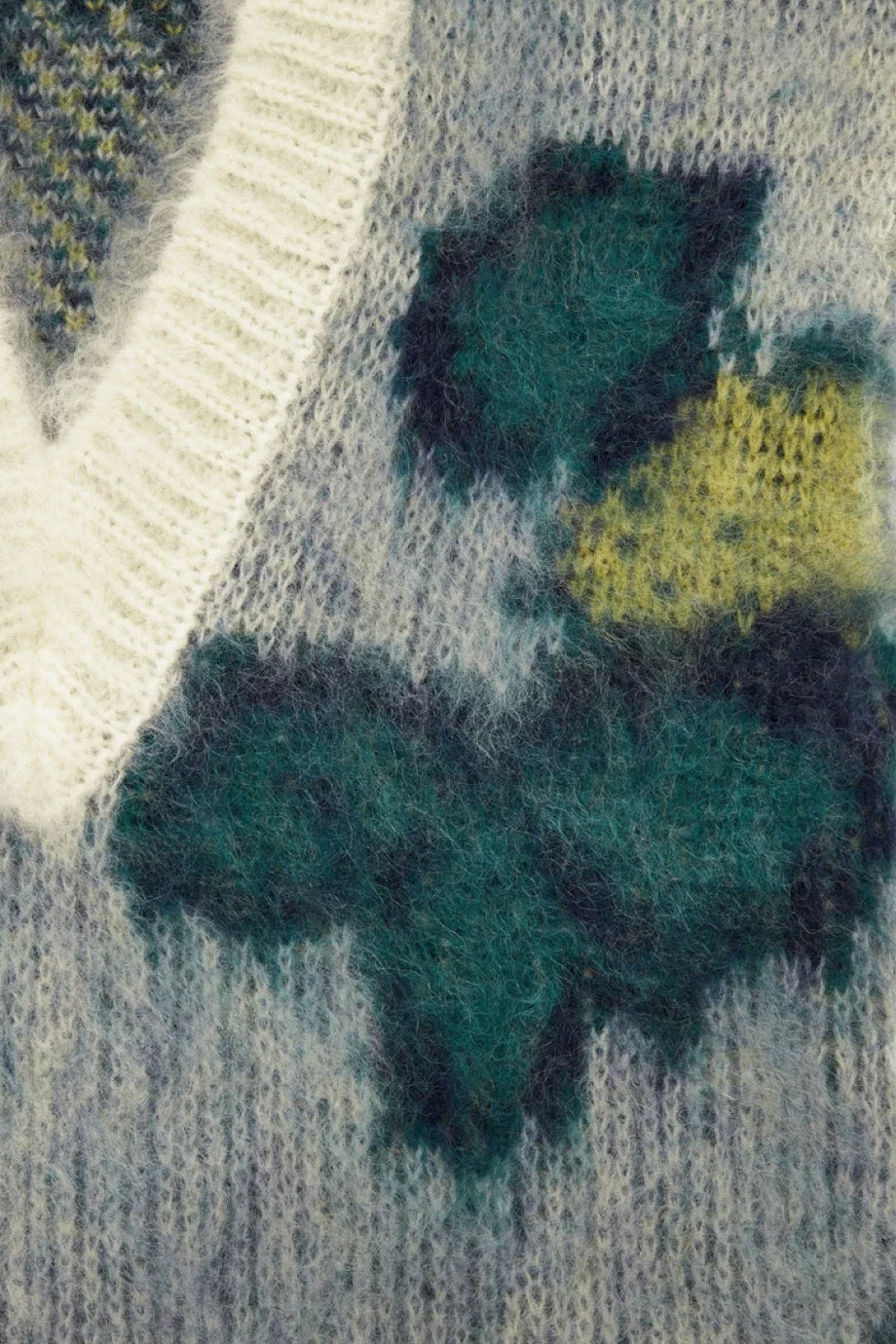 Theane Mouwloze V-halstrui