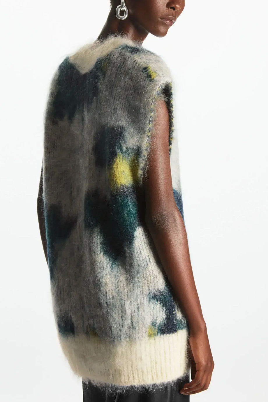 Theane Mouwloze V-halstrui