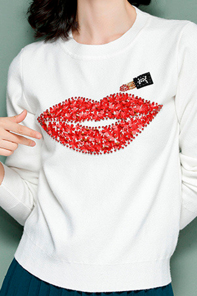 Rode lippen zwarte patroon trui